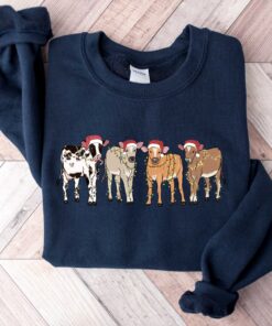 vintage christmas cow sweatshirt for women with highland cow design and festive lights crewneck style y4dtq scaled