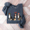 vintage christmas dog sweatshirt for dog lovers featuring cute dogs and holiday design ideal for dog moms and festive celebrations 99hcy