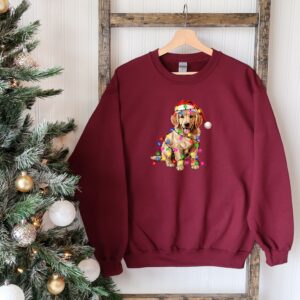 vintage christmas dog t shirt for dog lovers featuring golden retriever and christmas lights design ideal for new year celebrations i9y34