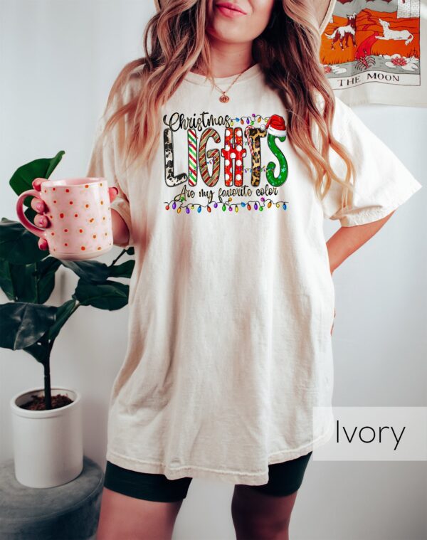 vintage christmas lights crewneck t shirt with leopard print design for holiday celebrations and comfortable wear