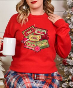 vintage christmas music sweatshirt retro design for music lovers featuring cassette tapes and classic christmas songs 7jeib scaled