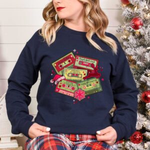 vintage christmas music sweatshirt retro design for music lovers featuring cassette tapes and classic christmas songs owbmf scaled