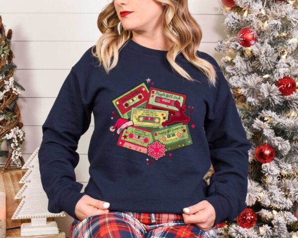 vintage christmas music sweatshirt retro design for music lovers featuring cassette tapes and classic christmas songs owbmf scaled