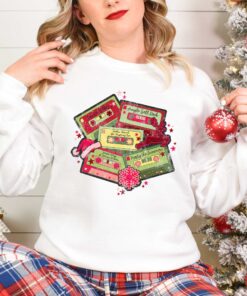 vintage christmas music sweatshirt retro design for music lovers featuring cassette tapes and classic christmas songs smvrl scaled