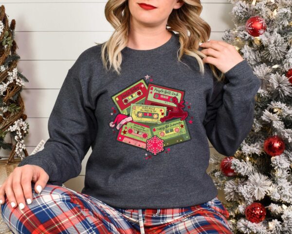 vintage christmas music sweatshirt retro design for music lovers featuring cassette tapes and classic christmas songs ymqbm scaled