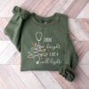 vintage christmas nurse sweatshirt shine bright like a call light merry nurse shirt with tree design for holiday cheer bzrw9 scaled