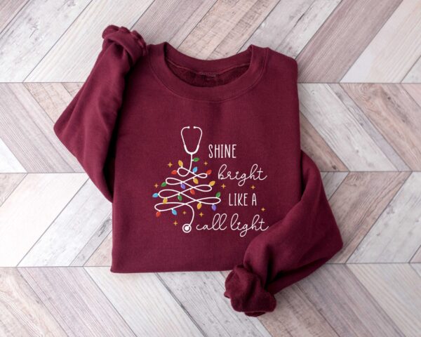 vintage christmas nurse sweatshirt shine bright like a call light merry nurse shirt with tree design for holiday cheer gms9e scaled