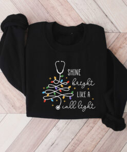 vintage christmas nurse sweatshirt shine bright like a call light merry nurse shirt with tree design for holiday cheer houdk scaled