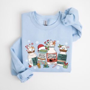 vintage christmas nurse t shirt for medical professionals featuring fun medication design long sleeve crew style mvgmw