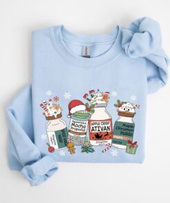 vintage christmas nurse t shirt for medical professionals featuring fun medication design long sleeve crew style mvgmw scaled