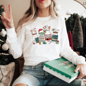 vintage christmas nurse t shirt for medical professionals featuring fun medication design long sleeve crew style nucmp scaled