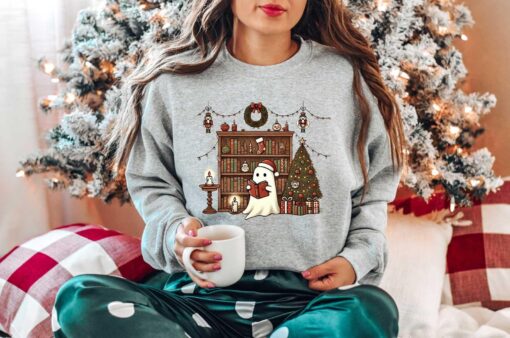 vintage christmas sweater for book lovers featuring ghost boo books design ideal for teachers and librarians vg3mc