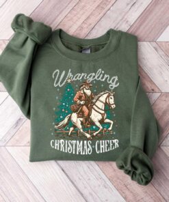 vintage christmas sweatshirt featuring cowboy santa design for western style festivities and holiday celebrations 0ytwi