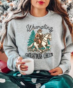 vintage christmas sweatshirt featuring cowboy santa design for western style festivities and holiday celebrations abtc8