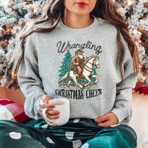 vintage christmas sweatshirt featuring cowboy santa design for western style festivities and holiday celebrations abtc8