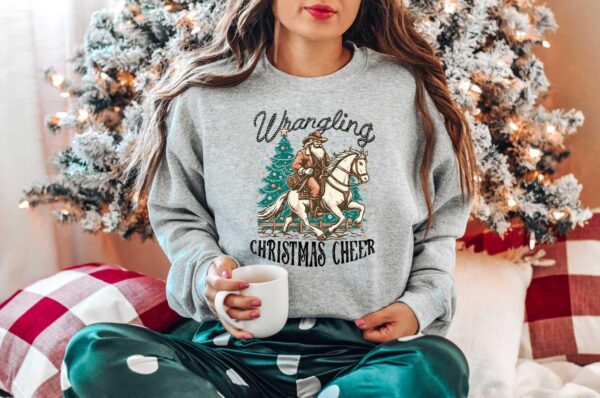 vintage christmas sweatshirt featuring cowboy santa design for western style festivities and holiday celebrations abtc8