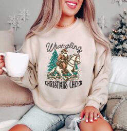 Vintage Christmas Sweatshirt featuring Cowboy Santa Design for Western Style Festivities and Holiday Celebrations