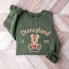 vintage christmas sweatshirt featuring disneyland est 1955 design with mickey and minnie for your holiday trips and cruises au3fn scaled