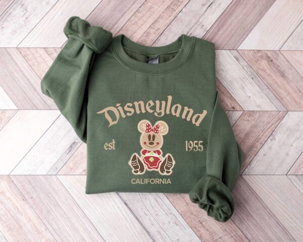 vintage christmas sweatshirt featuring disneyland est 1955 design with mickey and minnie for your holiday trips and cruises au3fn scaled