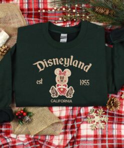 vintage christmas sweatshirt featuring disneyland est 1955 design with mickey and minnie for your holiday trips and cruises teogo scaled