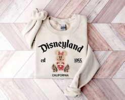 vintage christmas sweatshirt featuring disneyland est 1955 design with mickey and minnie for your holiday trips and cruises zrxvu scaled