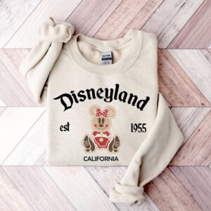 vintage christmas sweatshirt featuring disneyland est 1955 design with mickey and minnie for your holiday trips and cruises zrxvu scaled