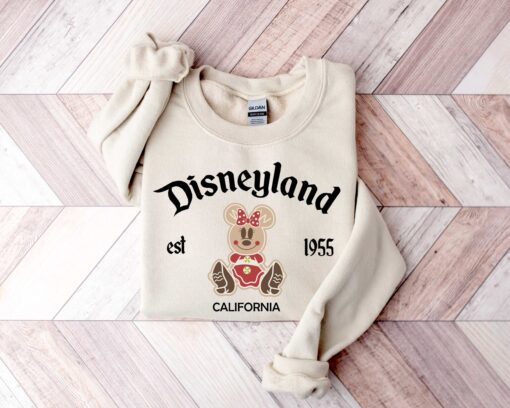 vintage christmas sweatshirt featuring disneyland est 1955 design with mickey and minnie for your holiday trips and cruises zrxvu scaled