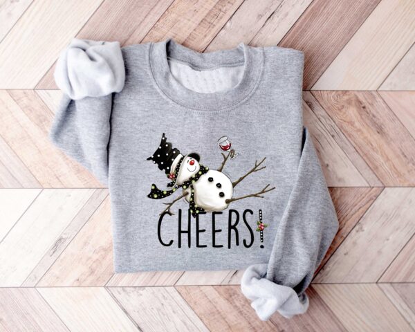 vintage christmas sweatshirt featuring drunk snowman drinking wine for winter holiday celebrations and festive style 8llzj scaled