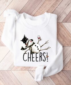 vintage christmas sweatshirt featuring drunk snowman drinking wine for winter holiday celebrations and festive style gzcta scaled