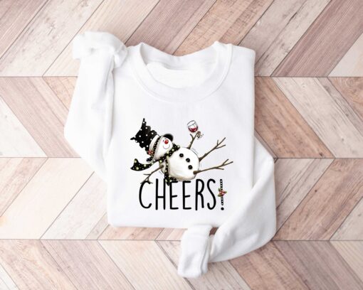 vintage christmas sweatshirt featuring drunk snowman drinking wine for winter holiday celebrations and festive style gzcta scaled