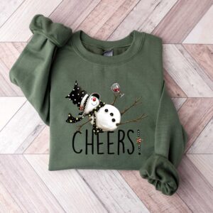 vintage christmas sweatshirt featuring drunk snowman drinking wine for winter holiday celebrations and festive style m8uac scaled