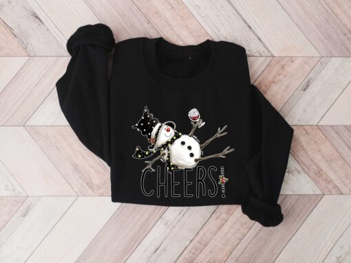 vintage christmas sweatshirt featuring drunk snowman drinking wine for winter holiday celebrations and festive style wp7rm scaled