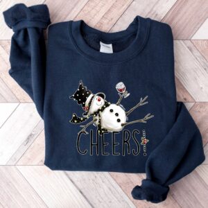 vintage christmas sweatshirt featuring drunk snowman drinking wine for winter holiday celebrations and festive style ylgif scaled