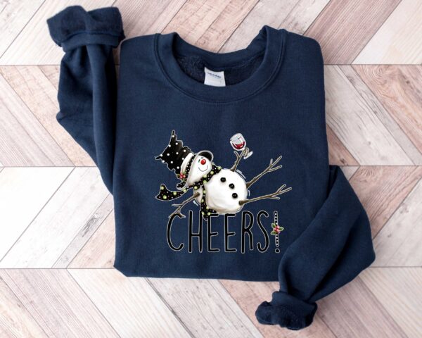 vintage christmas sweatshirt featuring drunk snowman drinking wine for winter holiday celebrations and festive style ylgif scaled