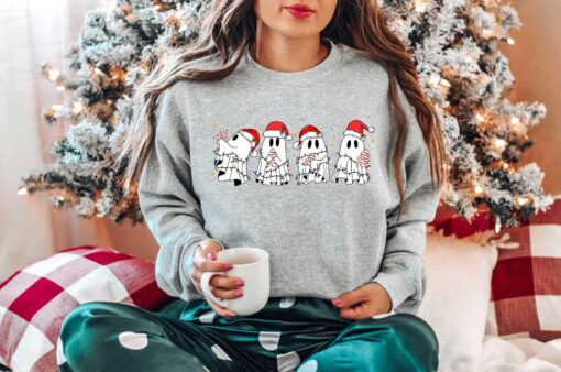 vintage christmas sweatshirt featuring ghost santa design for halloween and holiday celebrations unique funny christmas apparel