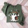 vintage christmas sweatshirt featuring ghost santa design for holiday celebrations and halloween parties 6uez0