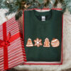 vintage christmas sweatshirt featuring gingerbread and cookies for family matching holiday apparel svg0c