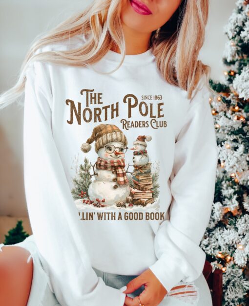 vintage christmas sweatshirt featuring north pole book club snowman design for book lovers and retro book worms dpbdw scaled