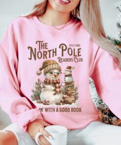 vintage christmas sweatshirt featuring north pole book club snowman design for book lovers and retro book worms nndej scaled