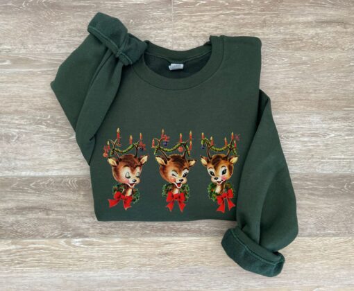 vintage christmas sweatshirt featuring reindeer design for holiday parties and festive gatherings cjctr