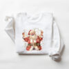 vintage christmas sweatshirt featuring retro santa design for holiday celebrations and seasonal comfort ajw0j