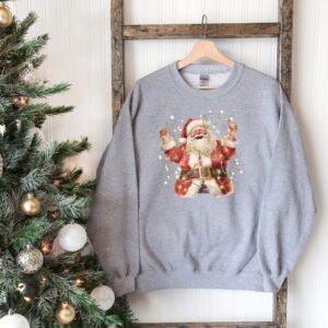 vintage christmas sweatshirt featuring retro santa design for holiday celebrations and seasonal comfort objib