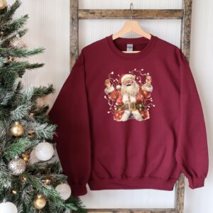 vintage christmas sweatshirt featuring retro santa design for holiday celebrations and seasonal comfort sjjoh