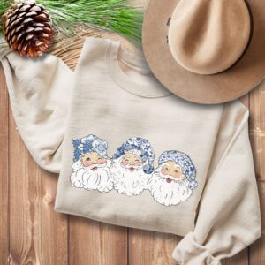 vintage christmas sweatshirt featuring retro santa design with toile de jouy print for women ideal for holiday celebrations anaip scaled