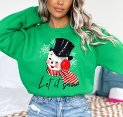vintage christmas sweatshirt featuring retro snowman design for holiday parties and festive gatherings ykrnx