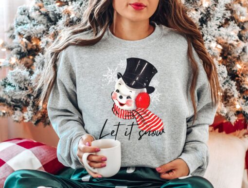 vintage christmas sweatshirt featuring retro snowman design for winter style and holiday comfort 7on4j scaled