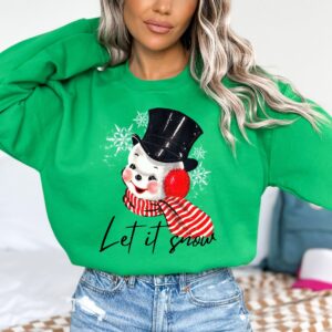 vintage christmas sweatshirt featuring retro snowman design for winter style and holiday comfort dgzij