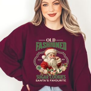 vintage christmas sweatshirt featuring santa claus and sugar cookies for a retro holiday look 9up19