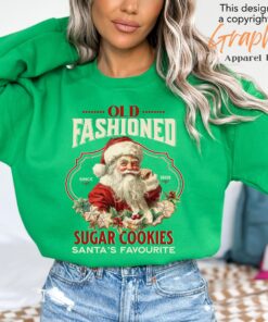 vintage christmas sweatshirt featuring santa claus and sugar cookies for a retro holiday look fgakp