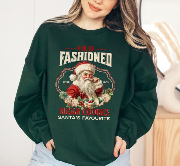 vintage christmas sweatshirt featuring santa claus and sugar cookies for a retro holiday look lrpwm